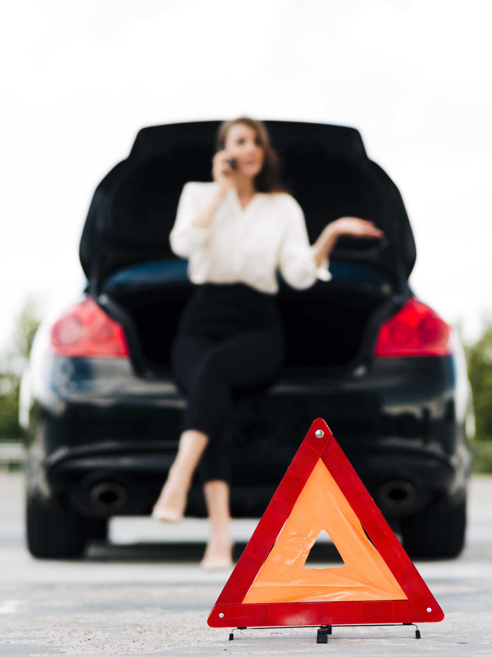 emergency-sign-woman-talking-phone2-scaled-2